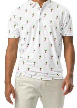 A man wearing a white slim fit polo shirt with a pink surfboard and palm trees pattern.