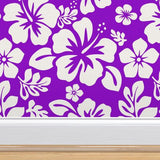 white hawaiian hibiscus flowers on purple wallpaper