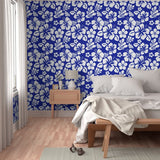 White Hawaiian Hibiscus Flowers on Royal Blue Wallpaper