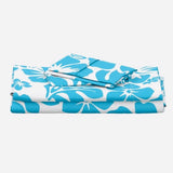 Aqua Ocean Blue Hawaiian Flowers on White Sheet Set from Surfer Bedding™️ Medium Scale - Extremely Stoked