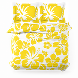 A yellow and white floral queen sizebedding set featuring a duvet cover and two matching pillowcases with a bold hibiscus flower pattern, shown against a plain white background.