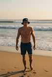 Denim Bucket Hat with Embroidered Big Smiley Logo | Surf and Beach Style by Extremely Stoked®