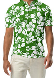 Man wearing a green and white floral hawaiian polo shirt on a white background